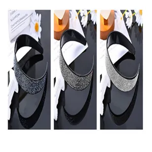 Rhinestone headband detail view, sparkling crystals, elegant wide hair hoop for women and girls.