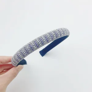 Sparkling rhinestone and pearl hair band, elegant purple beaded hair hoop for women and girls.