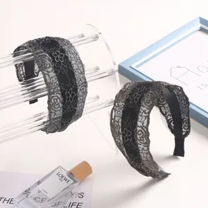 Exquisite black wide lace headband featuring delicate floral embroidery and comfortable non-slip teeth.