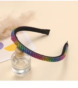 Rainbow rhinestone crystal headband detailed view, sparkling hair accessory for women styling.