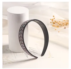 Detailed view of rhinestone studded hair hoop with teeth comb design for women elegant use.