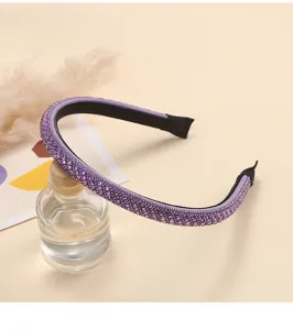 Purple crystal rhinestone headband detail shot, sparkling hair accessory for women.