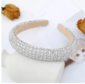 Close-up view of the sparkling rhinestone headband showcasing detailed crystal craftsmanship.