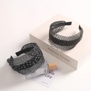 Detailed shot of black lace wide headband with exquisite embroidery and anti-slip teeth.