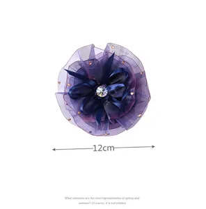 Mesh rhinestone hair flower clip detail, elegant purple floral hair accessory for women.