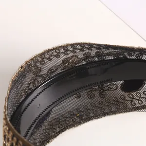 Black gold embroidered lace hairband with non-slip teeth, elegant hair accessory for women.