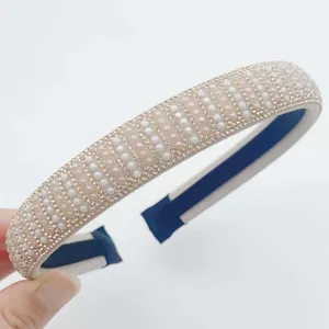 Elegant rhinestone pearl headband for women, sparkly fashion hair hoop for daily wear.