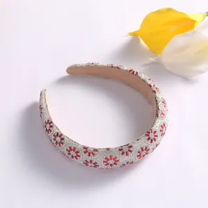 Serre-tête fleur en strass et cristal élégant, cerceau de cheveux large scintillant argenté.