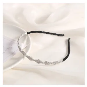 Detailed view of the silver rhinestone alloy headband sparkling crystals elegant hair accessory.