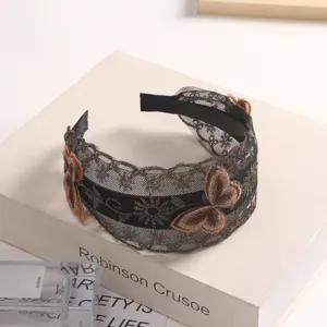 Black and gold lace embroidered headband, elegant butterfly hair hoop with non-slip design.