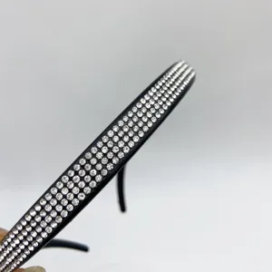 Detailed shot of a gorgeous black rhinestone headband, sparkling crystal hair accessory for women.