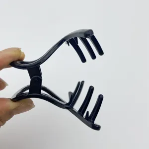 Small matte black hair claw clip detail view for thin hair daily practical styling use