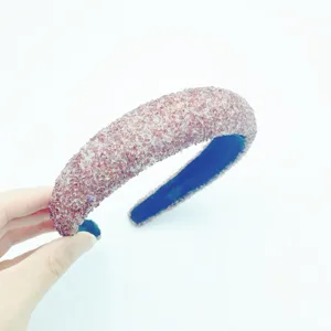 Detailed view of the sparkling pink crystal wide sponge headband, stylish and comfortable hair accessory.