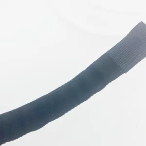 Close-up detail of black fabric wrapped headband soft texture hair accessory product view