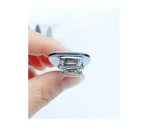 Detailed view of the metal duckbill hair clip spring mechanism, durable alloy base.