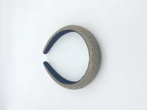 Rhinestone headband detail showing sparkling crystals on a thickened sponge base design.