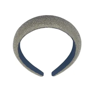 Close-up detail of thickened sponge crystal rhinestone padded headband shining bright.
