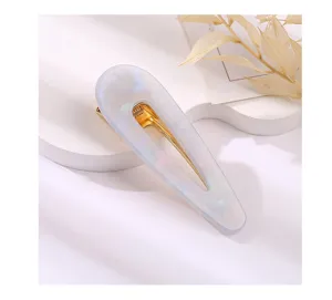 Elegant teardrop acrylic hair clip with blue marble pattern and gold metal clasp for women.