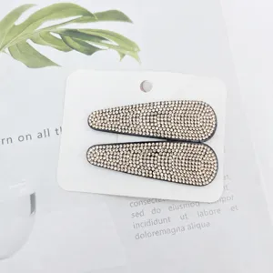 Sparkling rhinestone hair clips in elegant champagne color, secure snap design for daily styling.