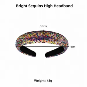Colorful sequin padded headband detail shot showing width and shimmer effect for party fashion.