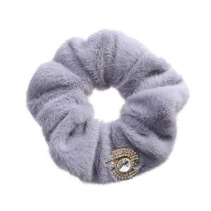 Grey furry hair scrunchie with sparkling rhinestone crystal embellishment detail shot.