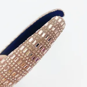Macro detail shot of crystal rhinestone embellished wide headband sparkle hair accessory