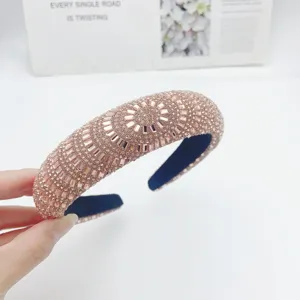 Sparkling rhinestone padded headband in rose gold, luxury crystal braided hair accessory.