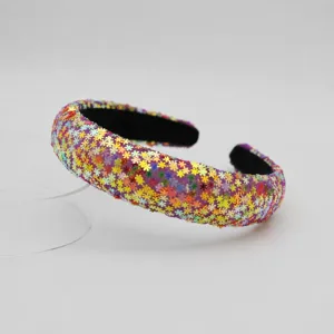 Sparkling colorful sequin headband close-up, wide sparkling glitter hair hoop detail.