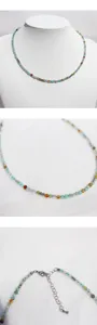 Close-up details of handmade multi-color faceted gemstone beaded necklace with clasp.