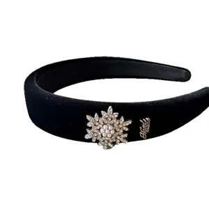 Black velvet headband with crystal pearl snowflake and sponge high crown design for women.