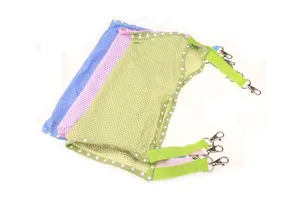 Breathable mesh pet hammock detail view, colorful polka dots with durable metal clips.
