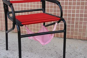 Breathable mesh pet hanging hammock detail showing pink polka dot design for cats and small dogs.