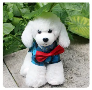 Detailed view of cute pet dog plaid shirt with red bow tie, perfect for small dogs cats.
