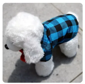 Close-up detail view of blue and black plaid dog shirt pet apparel for small dogs and cute cats.