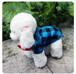 Dog plaid shirt detail showcasing the blue and black pattern and cute pet clothing design.