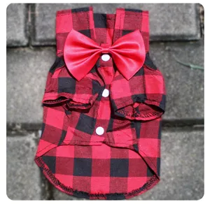 Red and black plaid dog shirt with red bow tie and white buttons for small pets