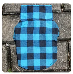 Blue and black plaid pet shirt detail view, classic collar design for dogs and cats, comfortable fabric.