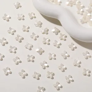 Mini jelly flower acrylic charms detail view, glossy four petal DIY jewelry accessories part.
