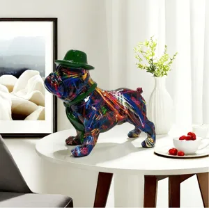 Detailed view of colorful graffiti resin French bulldog figurine with green hat, home decor scene.