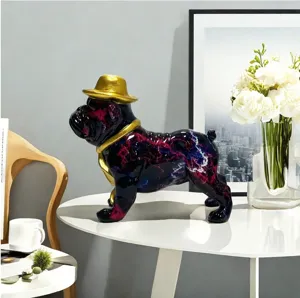 Detailed view of the resin French bulldog statue with golden hat and cosmic color pattern.