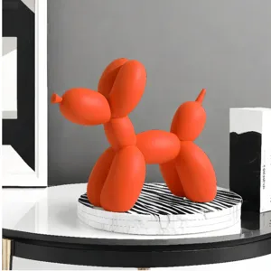 Moderna nórdica resina globo perro estatuilla escultura decoración hogar mesa naranja