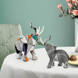 Decorative resin abstract elephant figurine set, vintage home decor for living room desk.