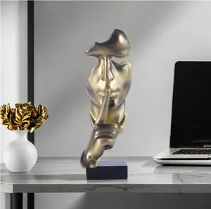 Resin abstract face silence is golden sculpture ornament for desktop office decor home art
