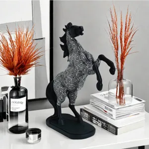 Detailed shot of a modern black and white abstract horse figurine for stylish home living room decor.