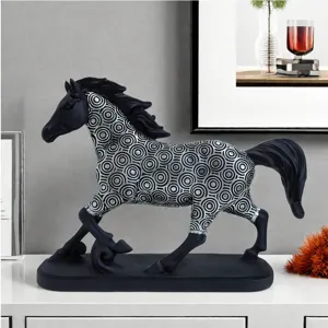 Detailed view of the elegant black and silver running horse figurine for modern home decor.
