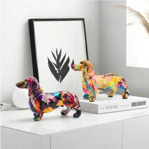 Colorful resin dachshund figurine, abstract graffiti dog statue for home office desk decoration.