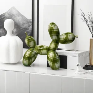 Detailed view of green plaid balloon dog resin ornament, perfect for modern home decor.