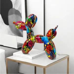 Detailed close-up view of the colorful graffiti balloon dog resin sculpture in a modern home.