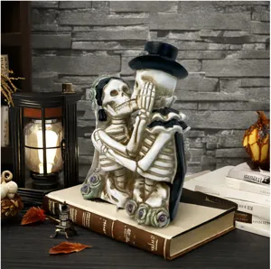 Halloween skeleton couple resin figurine detail shot, gothic spooky decor prop for party.