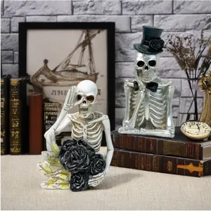 Halloween skeleton figurine detail view, resin skull decor featuring black roses and top hat.